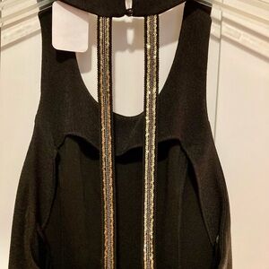 Black party dress with low back edged in gold sequins and beading 42” long